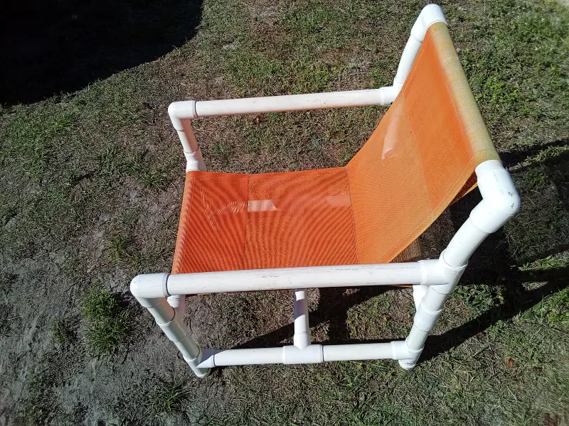 Lightweight patio chair with a sturdy PVC frame and breathable orange mesh sling seat. Comfortable, weather-friendly, and easy to move—ideal for patios, porches, pool areas, or outdoor seating. Gently used. Sold individually. 💲 $25 donation requested (each)